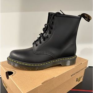 Dr. Martens black lace up boot in size 9 or 41 in women and 8 in men.